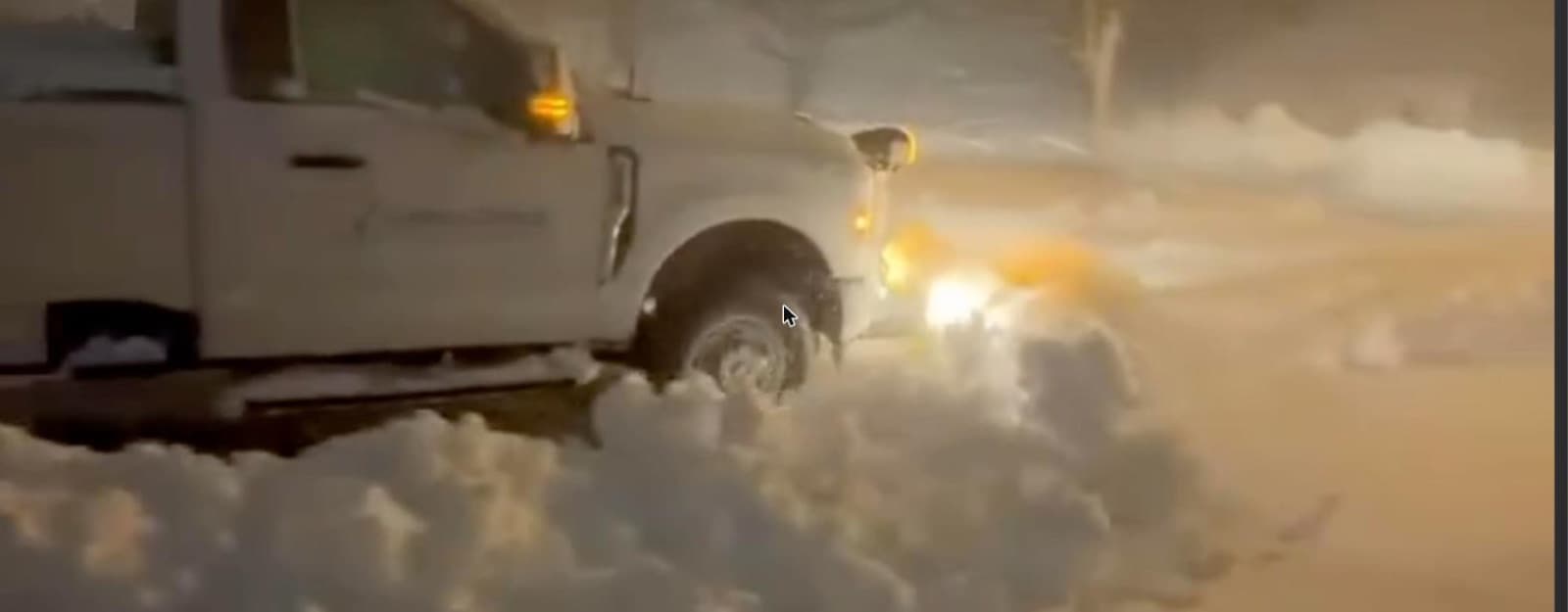 A LawnCheck plow truck on its priority commercial route in heavy snow