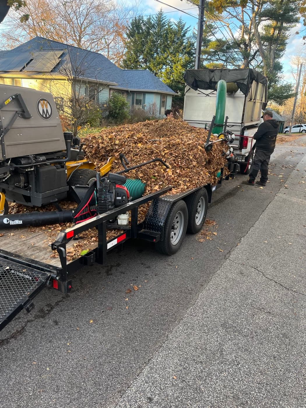 The trailer loaded with leaves