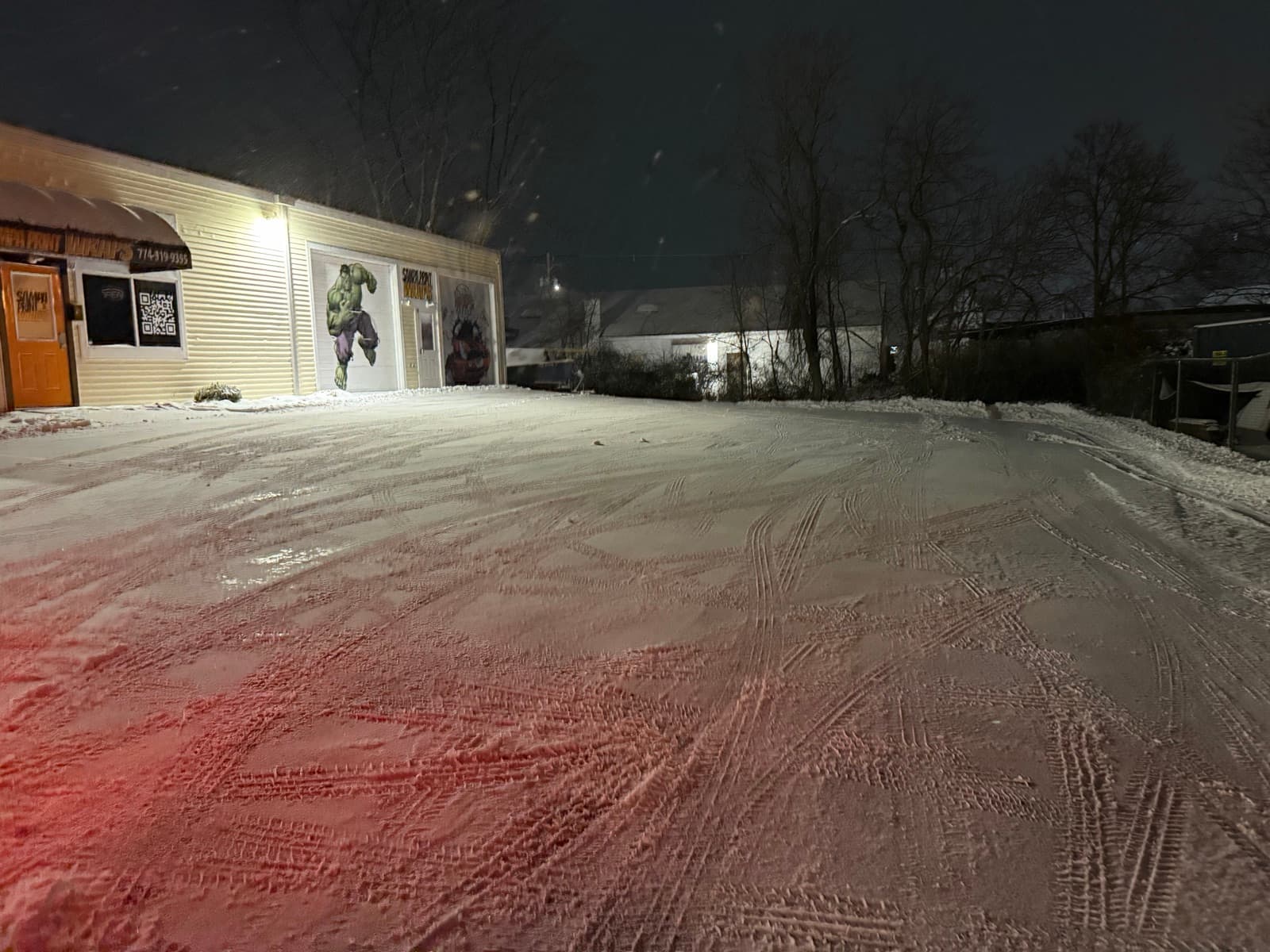 A plowed and treated lot at night